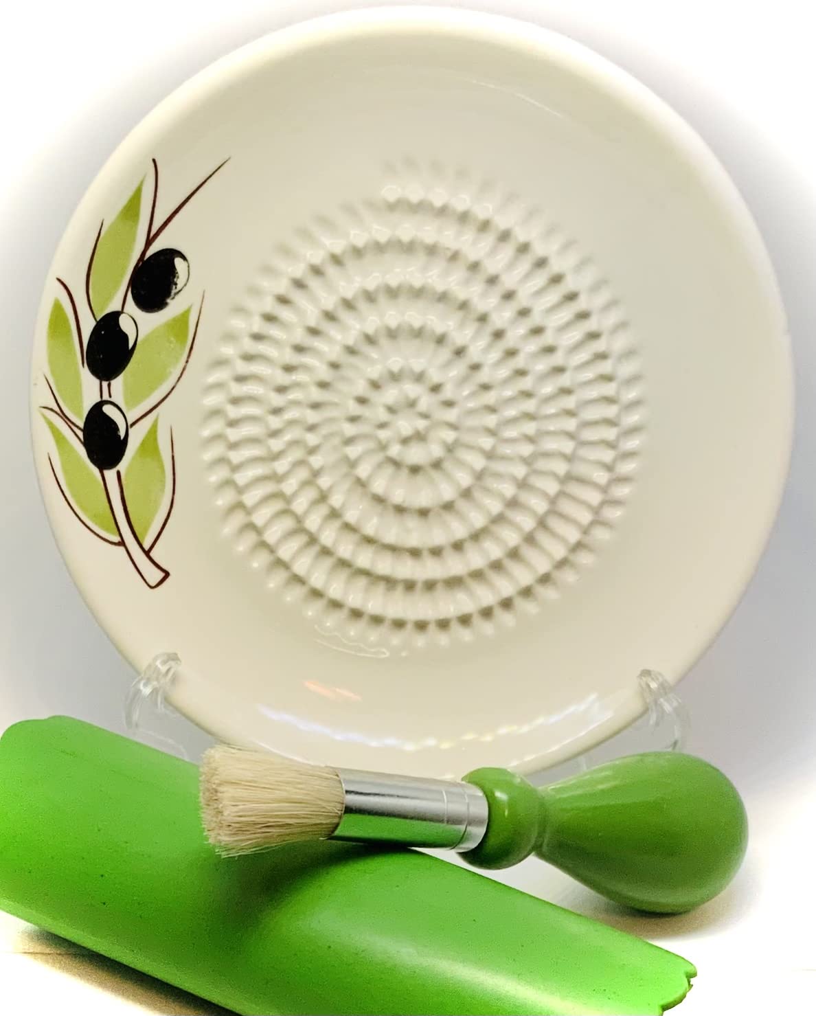 BonCera garlic grater plate close-up showing sharp ridges for effortless shredding.