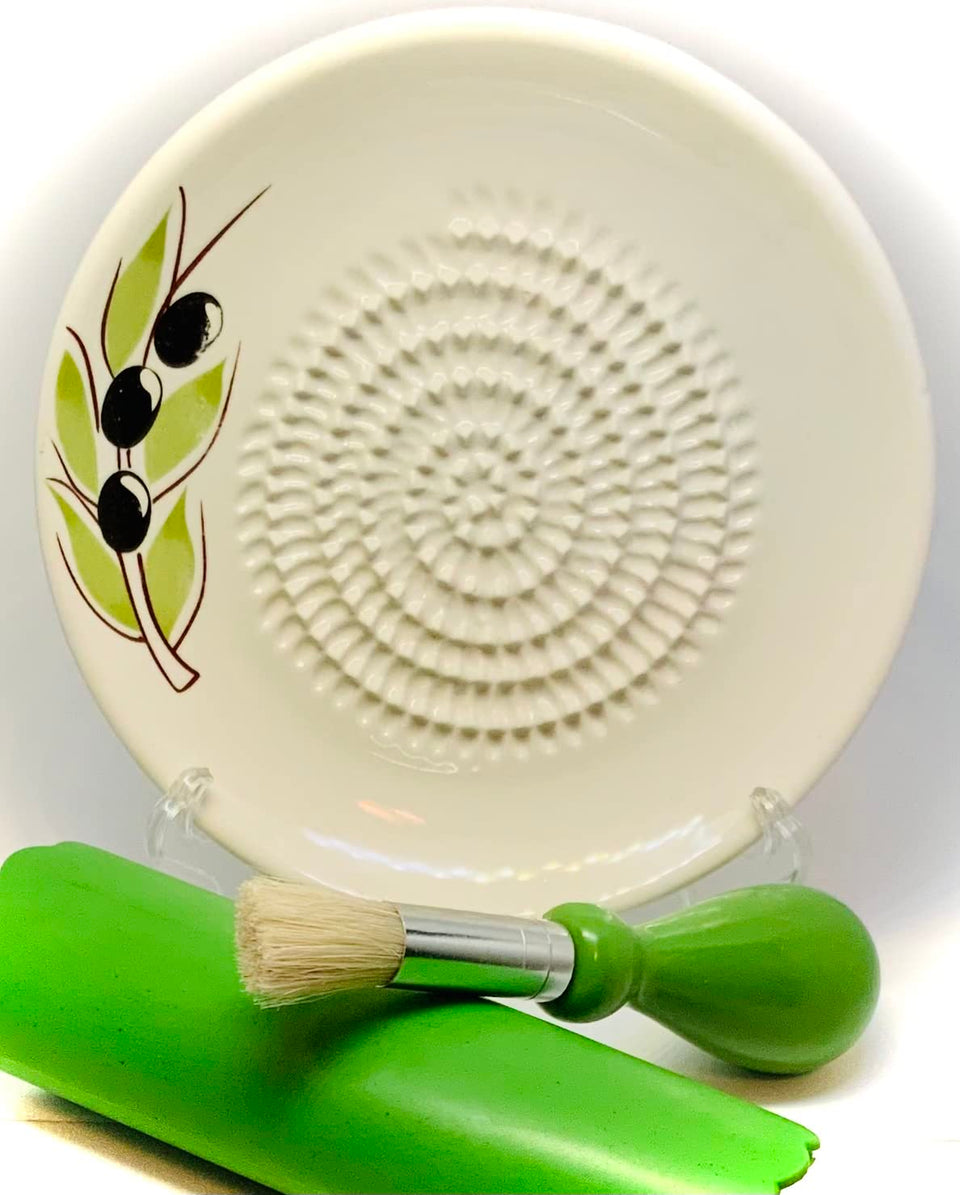 BonCera garlic grater plate close-up showing sharp ridges for effortless shredding.
