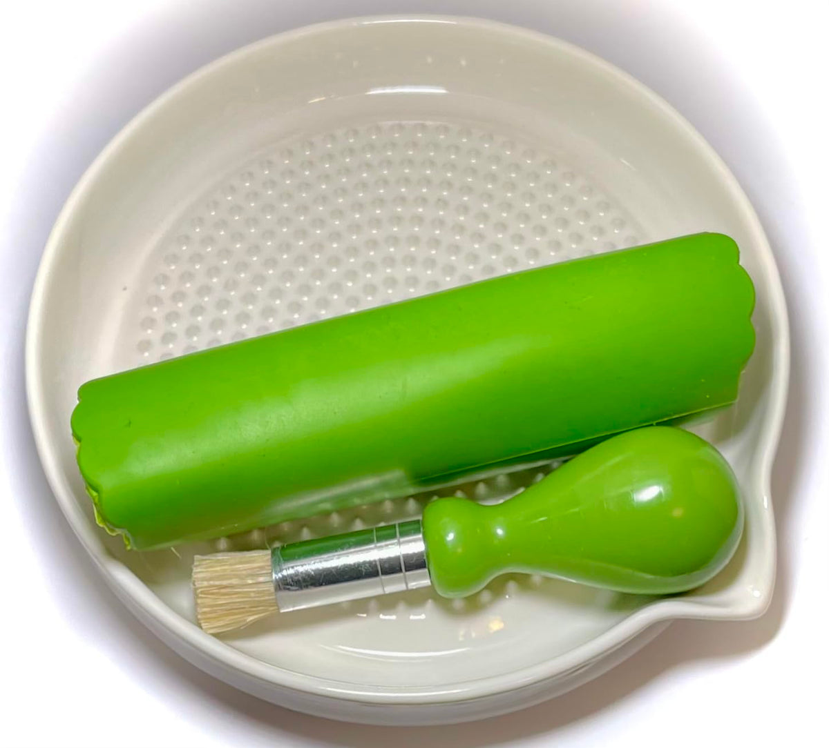 BonCera garlic peeler tube for easy prep before grating.