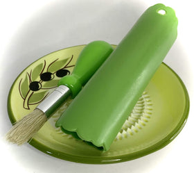 BonCera gathering brush helps remove shredded ingredients from the plate