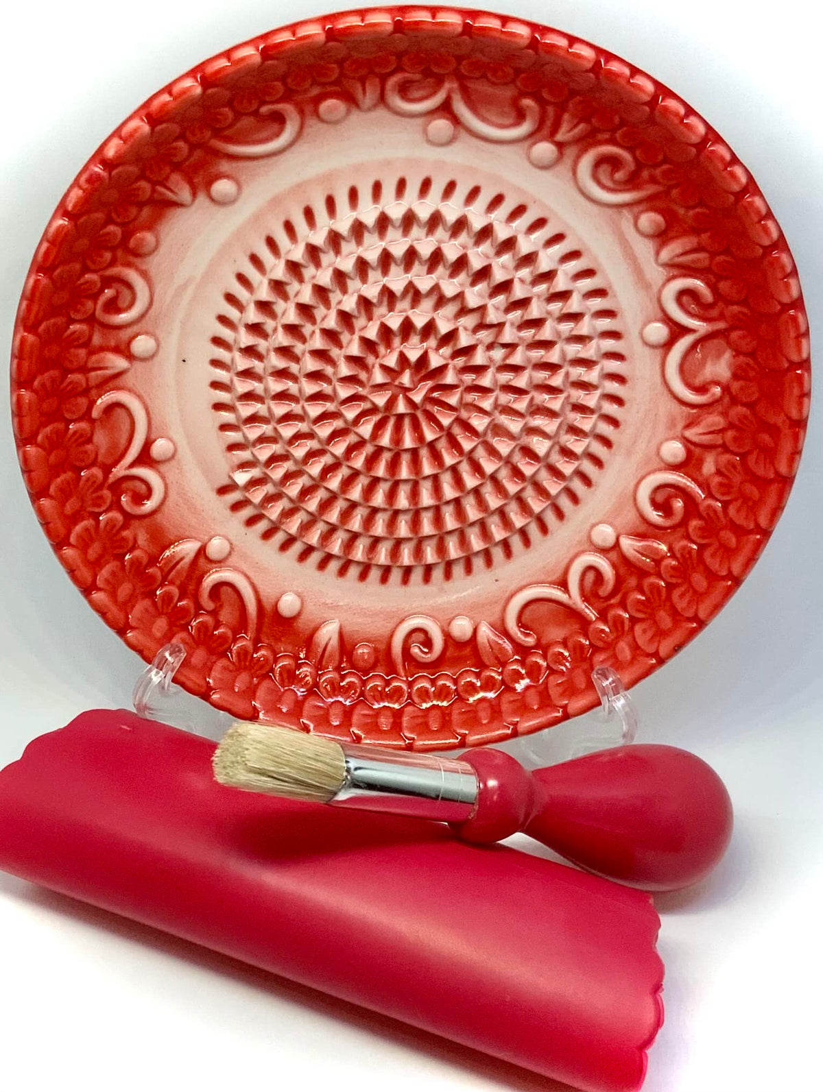 BonCera red embossed plate design adds color and kitchen charm.