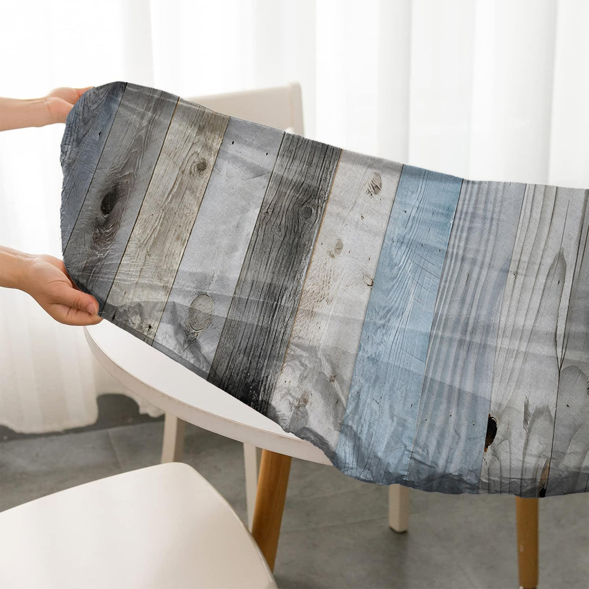 BOOWEATS wind-proof round tablecloth stays in place outdoors during gatherings
