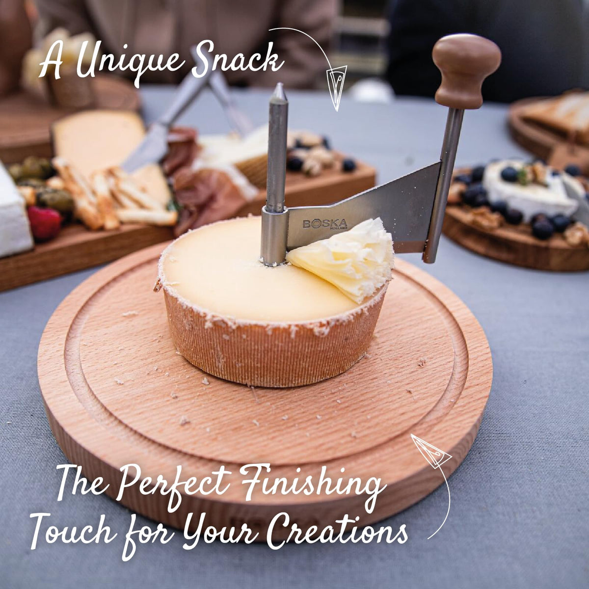 BOSKA Amigo pin accessory helps secure the cheese wheel during shaving.