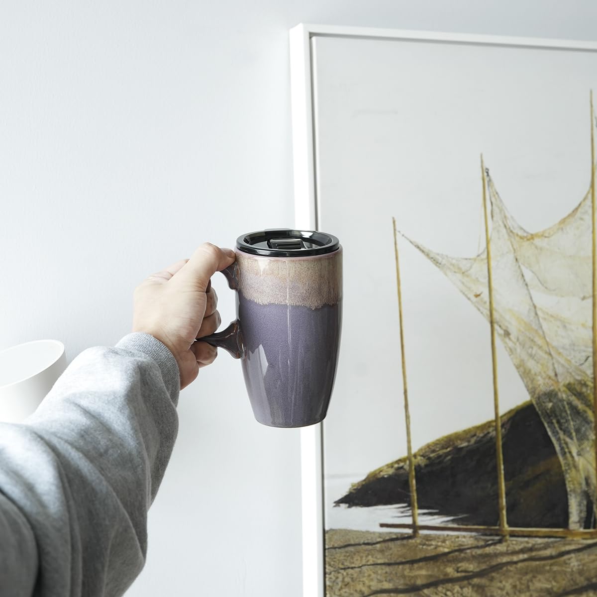 Leather sleeve on Bosmarlin mug provides a secure grip for hot beverages.