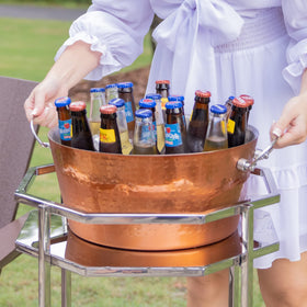BREKX insulated ice bucket at service bar for bottle presentation.