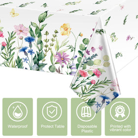 Breling spring floral tablecloth laid across a long dining table
