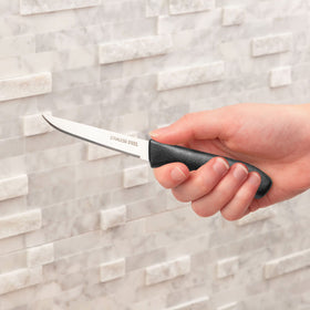Brenium paring knife with green ergonomic handle for comfortable control.
