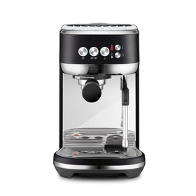 Breville Bambino Plus front view, compact kitchen ready for café-quality espresso