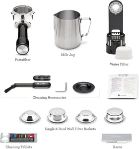 Included accessories: portafilter, milk jug, and cleaning tools ready to use