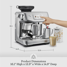 Breville Barista Touch Impress puck system in action for balanced extraction.