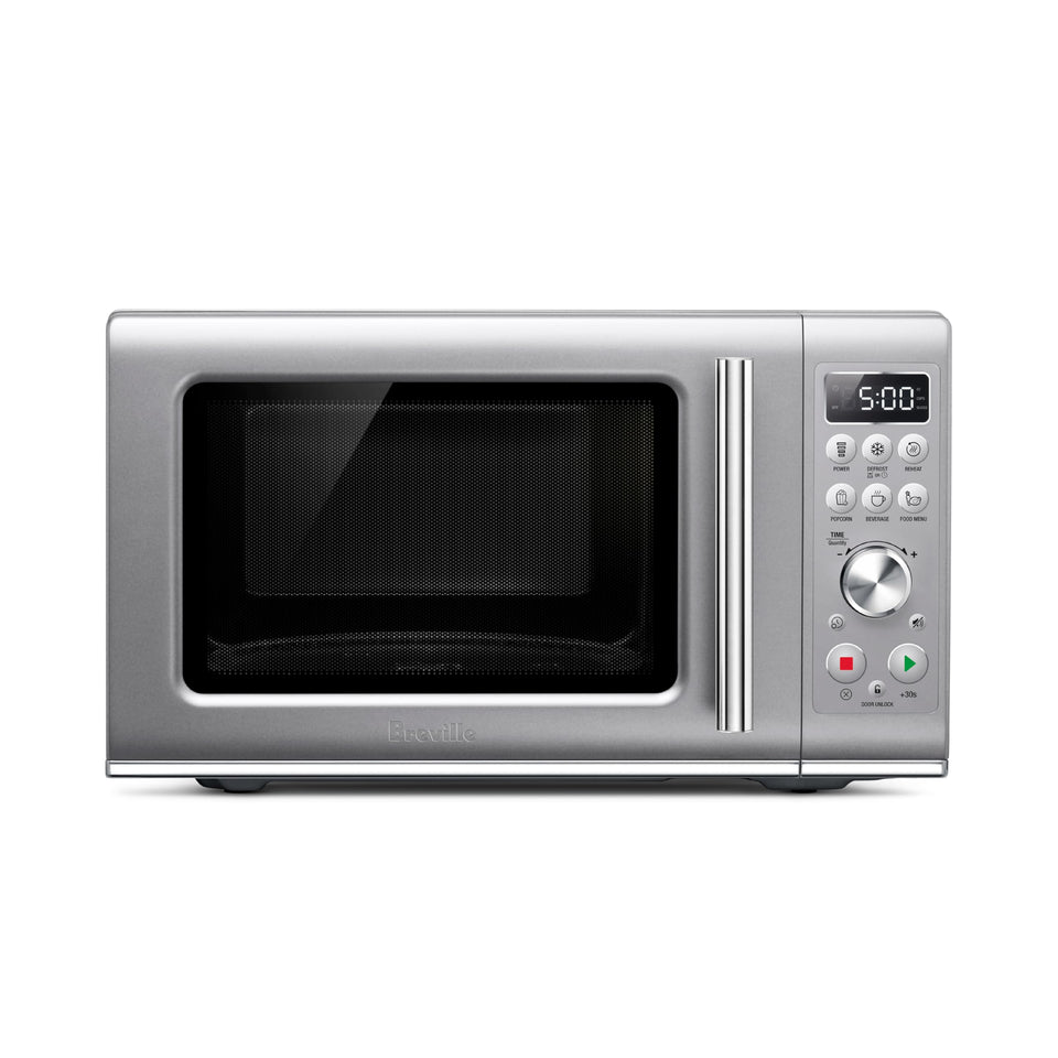 Breville BMO650SIL compact microwave front view highlighting space-saving design.