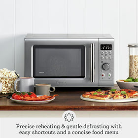 Breville BMO650SIL soft-close door demonstrating quiet operation.