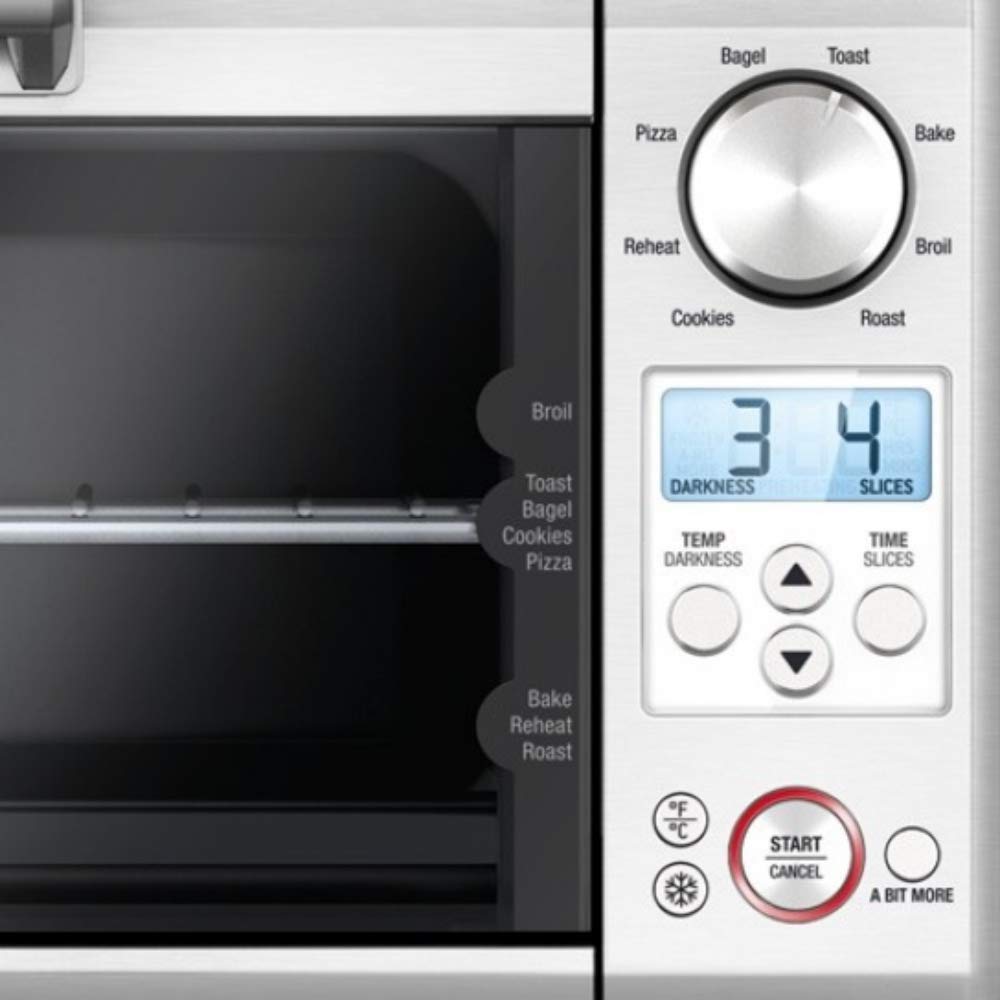 Breville BOV450XL enamel baking pan close-up demonstrates included accessory for even baking.