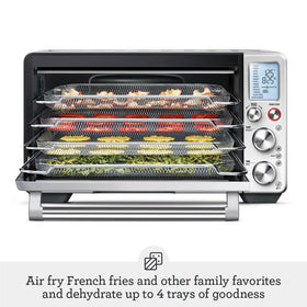 Breville BOV900BSS interior oven light helps monitor progress during cooking.