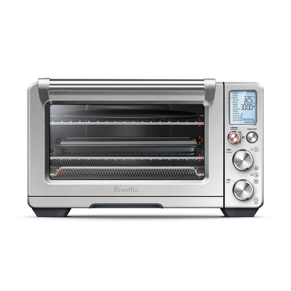 Breville BOV950BSS exterior countertop oven on kitchen counter, brushed stainless steel finish
