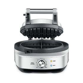 Breville BWM520XL no-mess moat closeup shows spill control for clean counters.