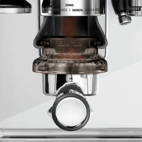 Breville Dosing Funnel attached to grinder cradle enables efficient dosing.