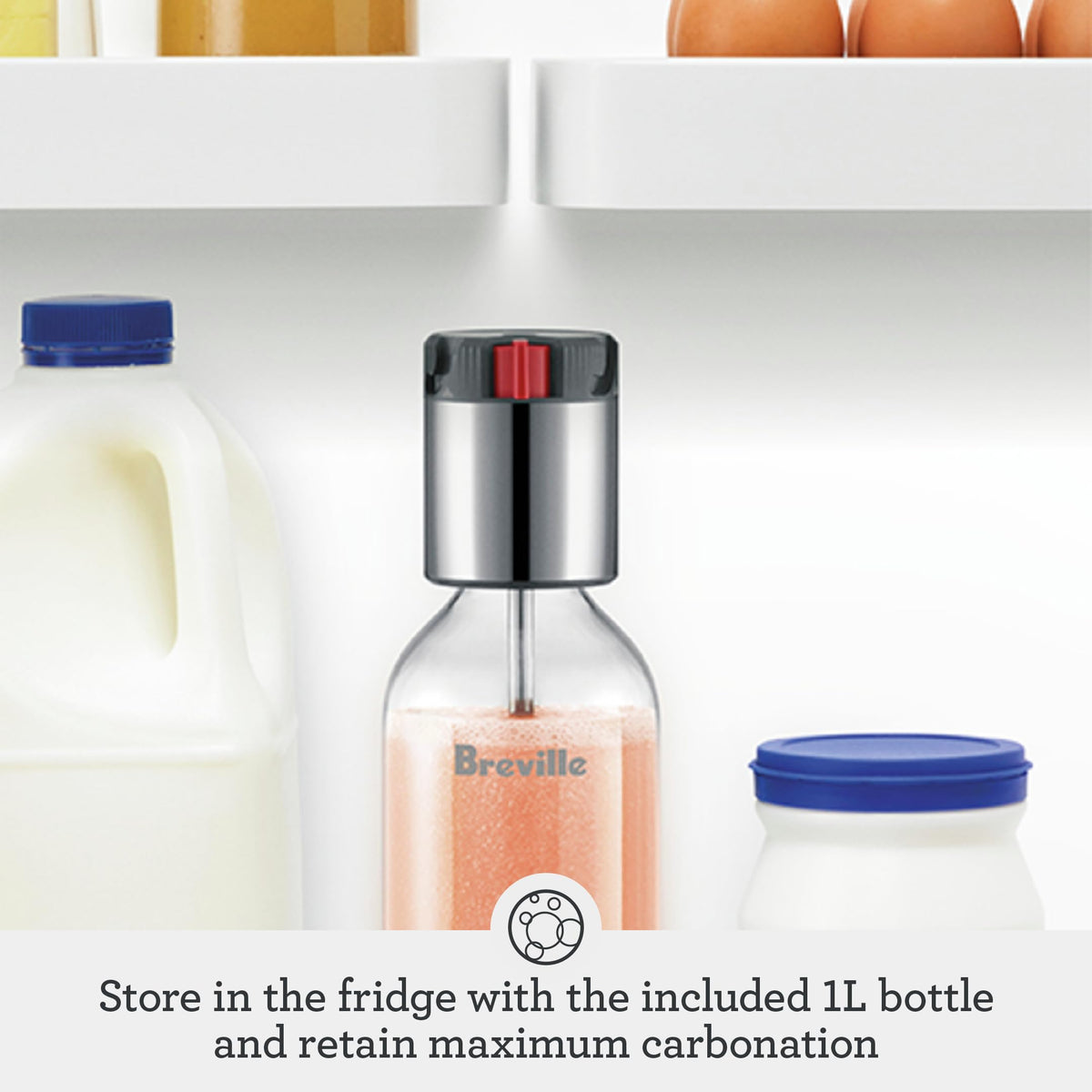 Breville InFizz pouring carbonated beverage with precision and control.