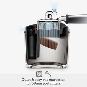 Breville Puck Sucker beside dishwasher-safe container for easy puck disposal