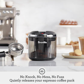 Breville Puck Sucker showing vacuum activation for fast puck removal