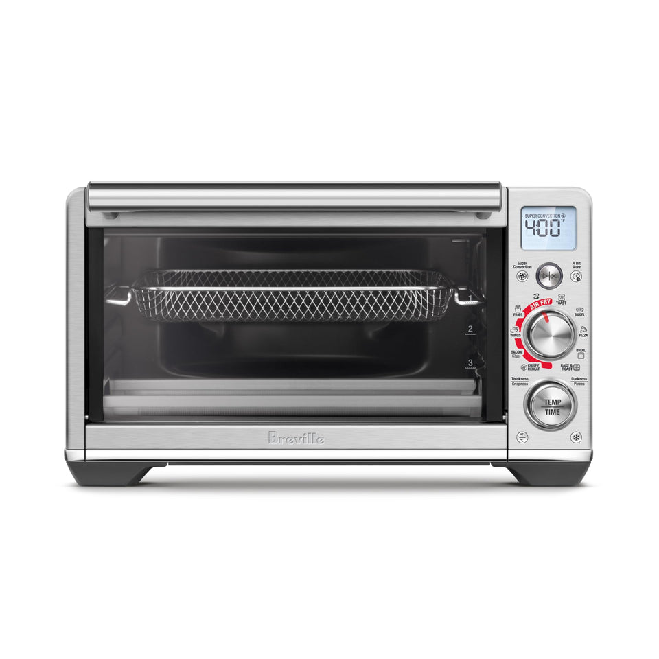 Breville Smart Oven Air Fryer Compact interior view showing ample cooking space for meals.