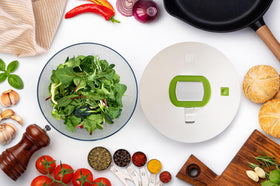 Brieftons salad spinner collapsible handle for compact storage after use.