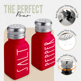 Close-up of Brighter Barns red glass shaker with stainless steel lid for precise pours.