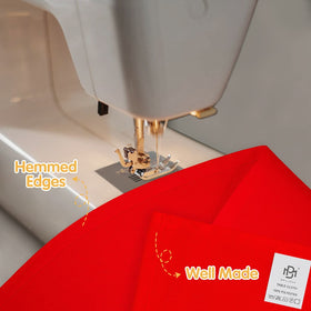 BRILLMAX red tablecloth wrinkle-resistant finish keeps a smooth banquet setup.