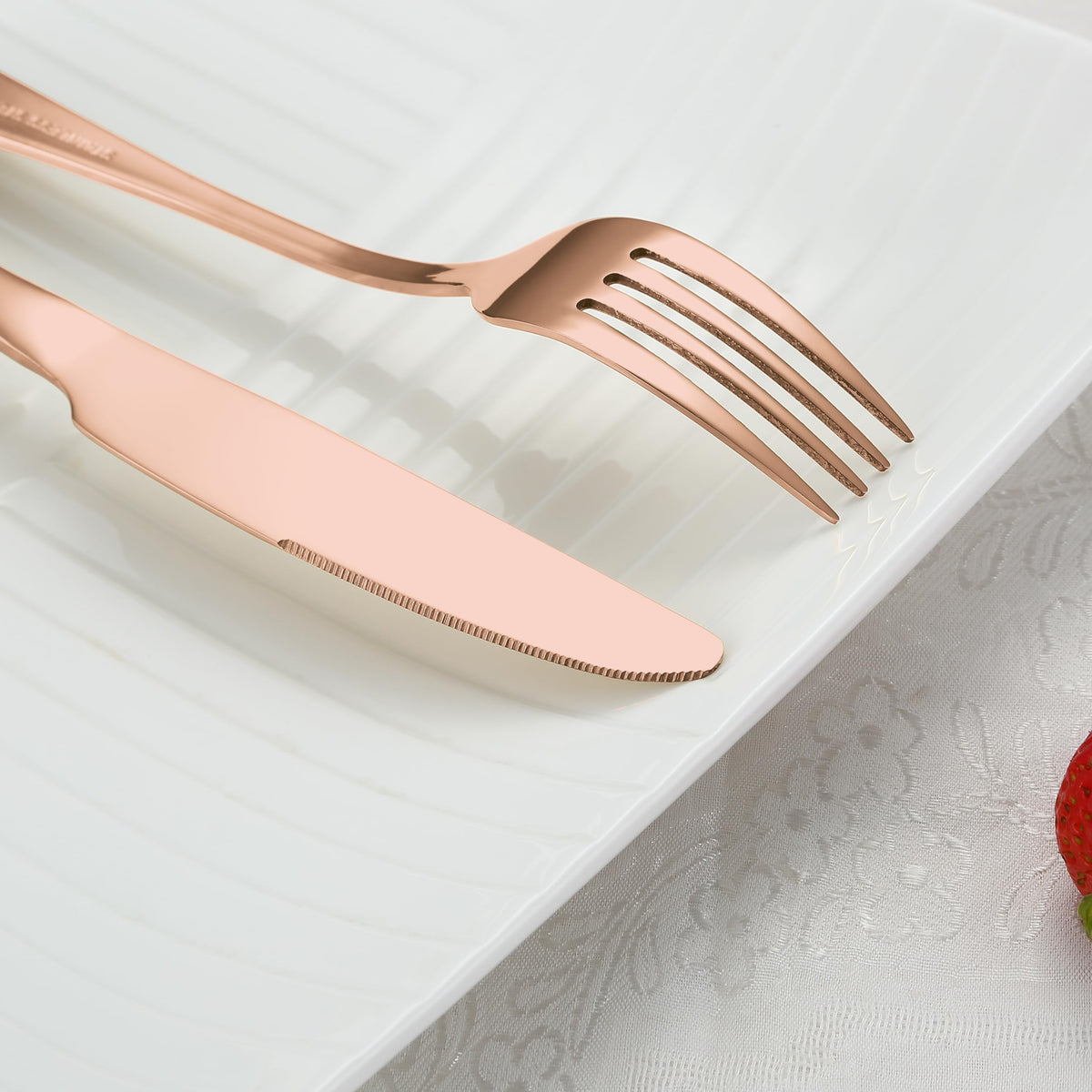 BRIOUT rose gold flatware cleaning close-up showing easy wipe-clean surface.