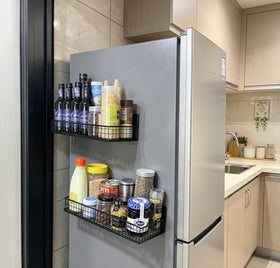 Metal peg board Bruda organizer offers flexible placement options on a surface.