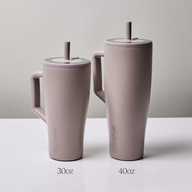 BrüMate Era 40oz fits most cup holders for travel convenience.