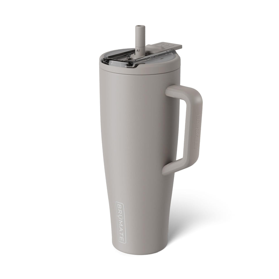 BrüMate Era Flip 40oz with covered straw lid for leakproof sipping on the go.