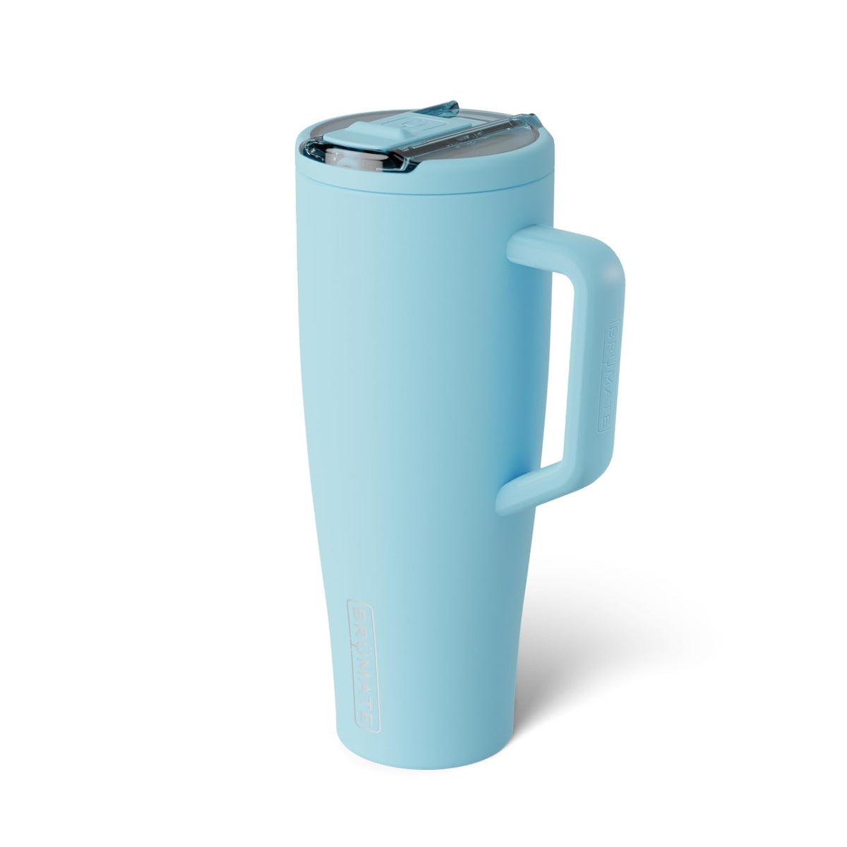 Brumate Era Flip 40oz with covered straw shields sipping from dust.