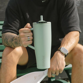 BrüMate Era Flip 40oz tapered base fits standard cup holders.