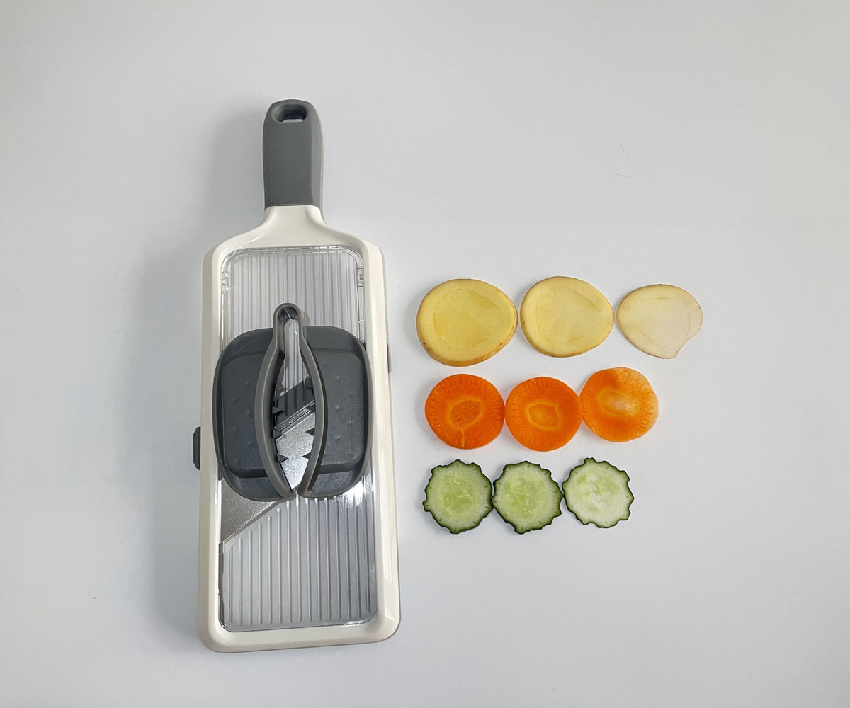 Brvnpily Handheld Mandoline with adjustable thickness dial for precise slices from thin to thick.