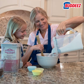 Buddeez flip-top lid with built-in spout for precise pouring