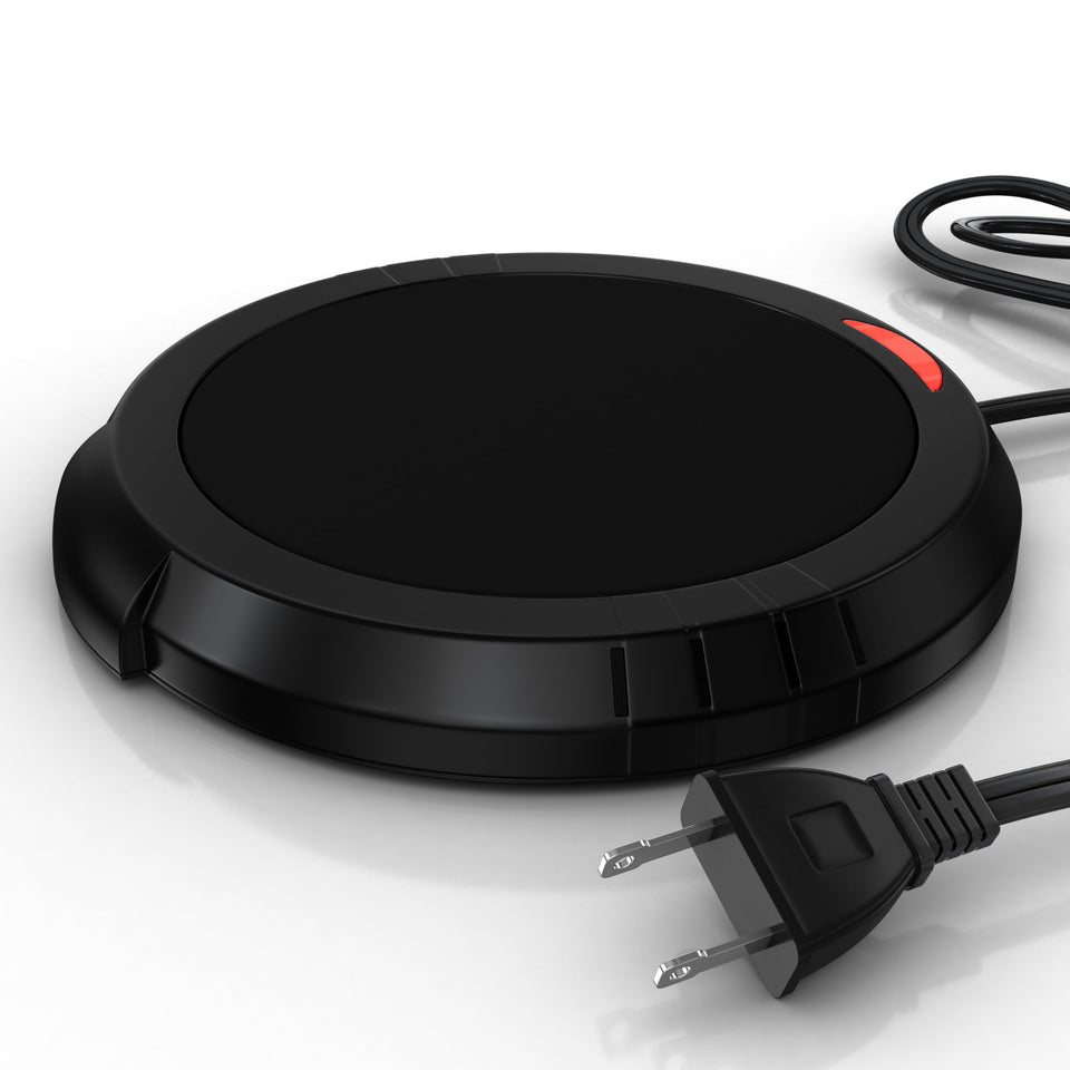 Bulk Paradise candle warmer plate on a table releasing aroma safely without flame.