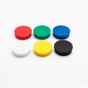 Bullseye Office green magnet securing papers on whiteboard