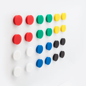 Bullseye Office magnets holding papers on metal calendar
