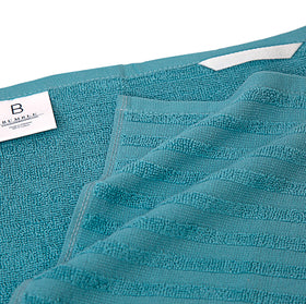 Bumble Towels flat towel on counter for drying tasks in the kitchen.