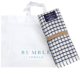 Bumble Towels with hanging loop for easy drying and accessible storage.