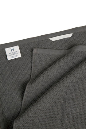 Bumble Towels towels with hanging loop for easy drying and storage.