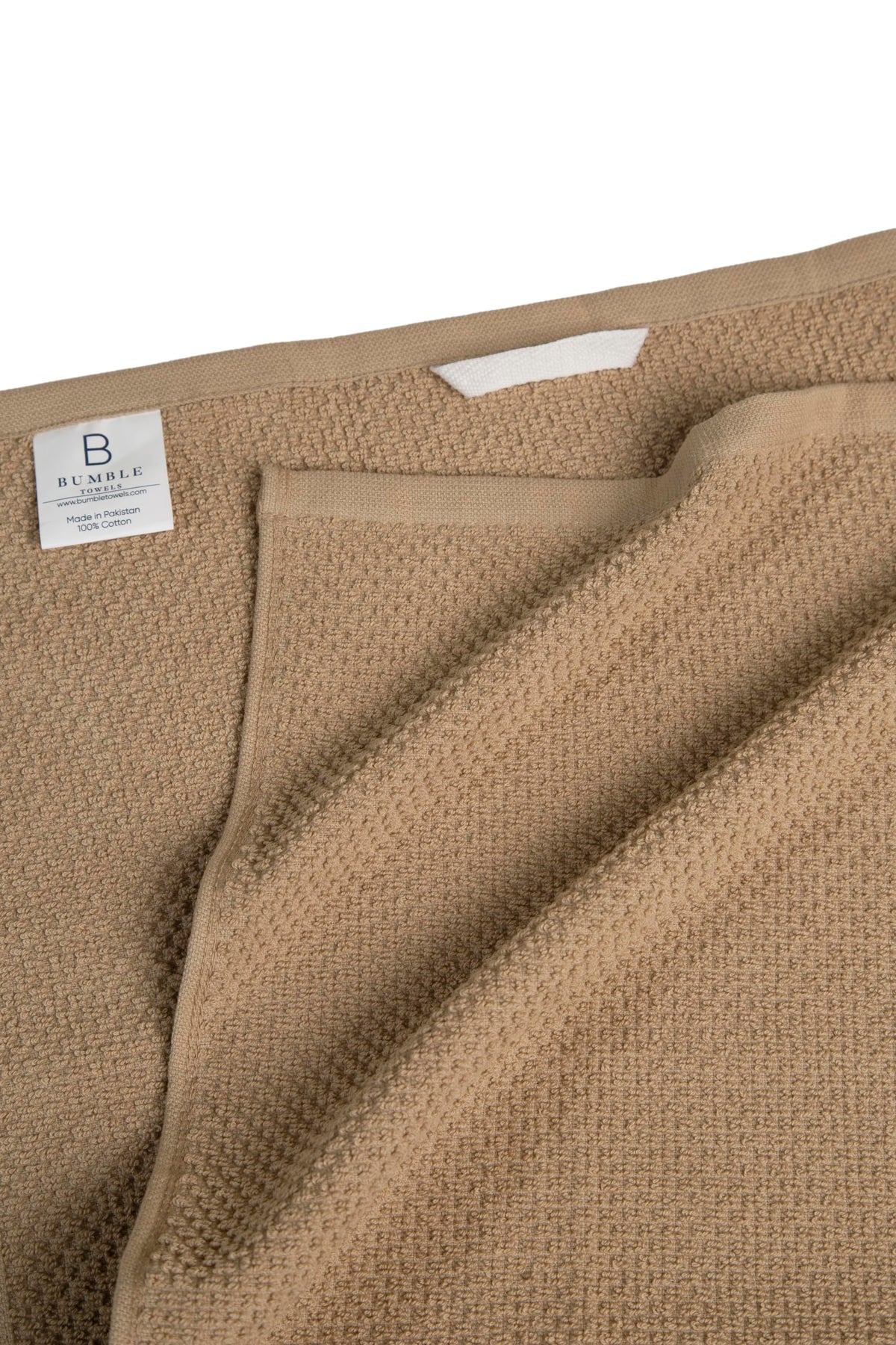 Bumble Towels popcorn-striped design close-up highlights stylish kitchen decor