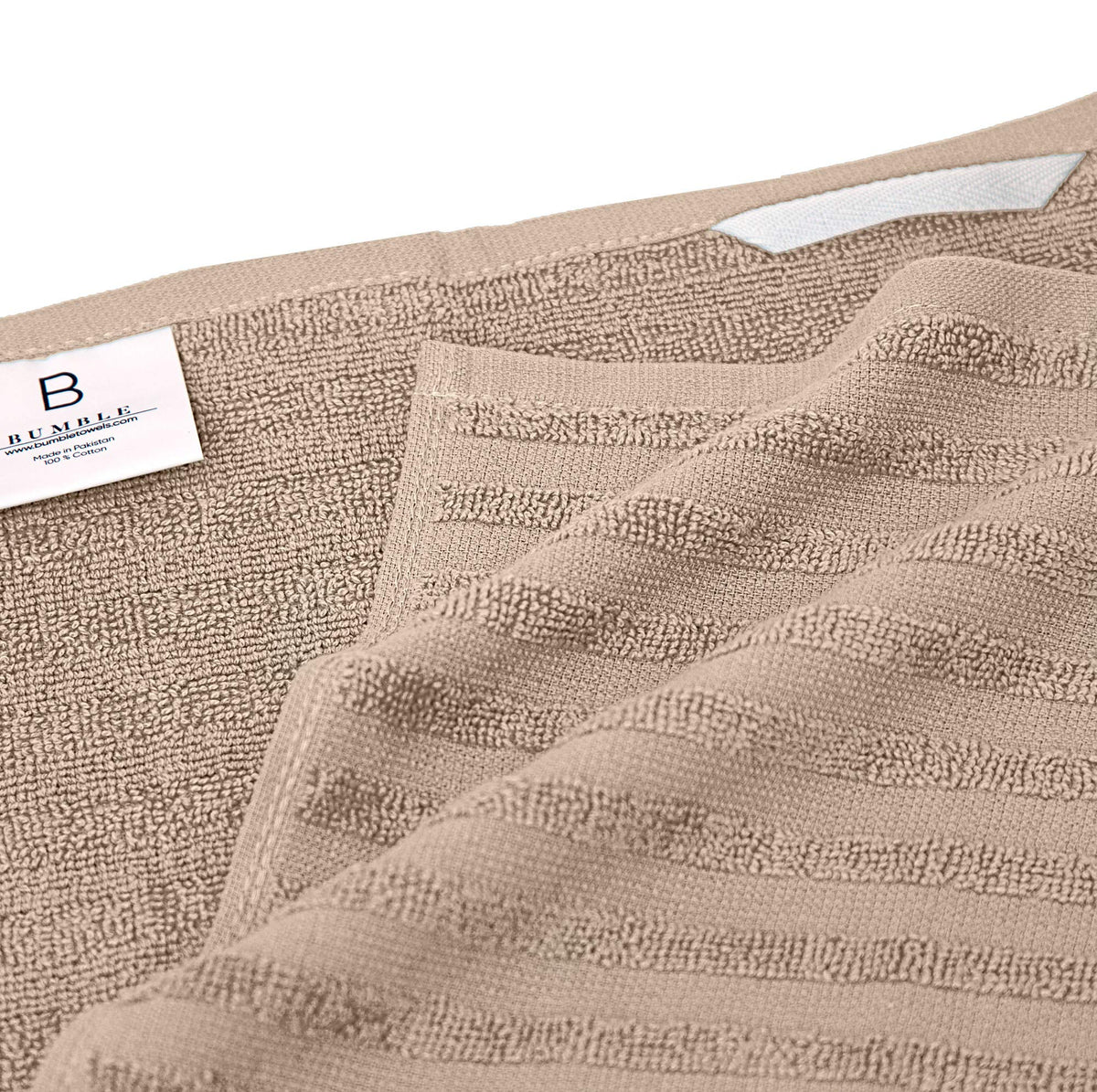 Bumble Towels six-pack in tan includes a stylish tote bag for gifting.