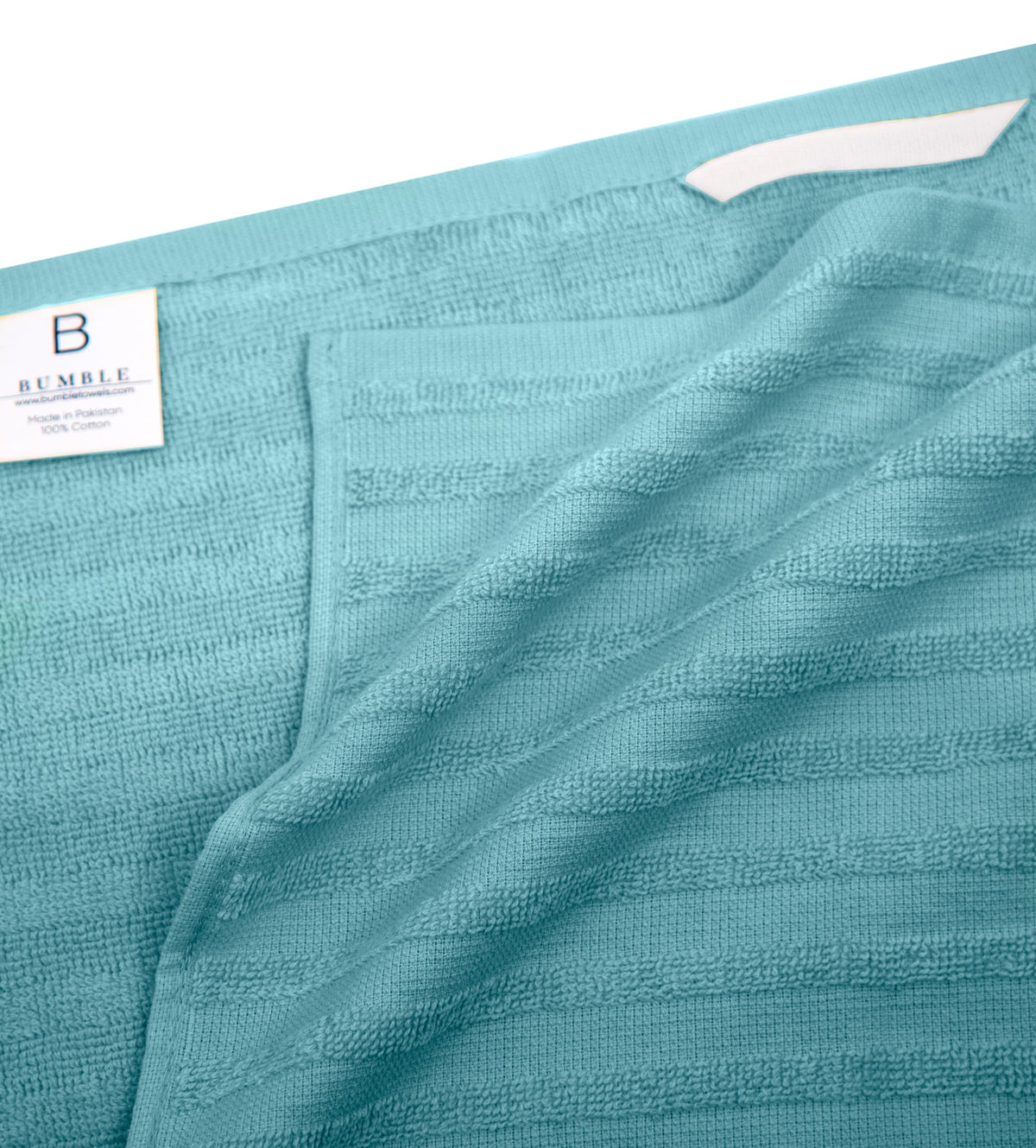 Bumble Towels hanging loop enables easy air drying and organization.