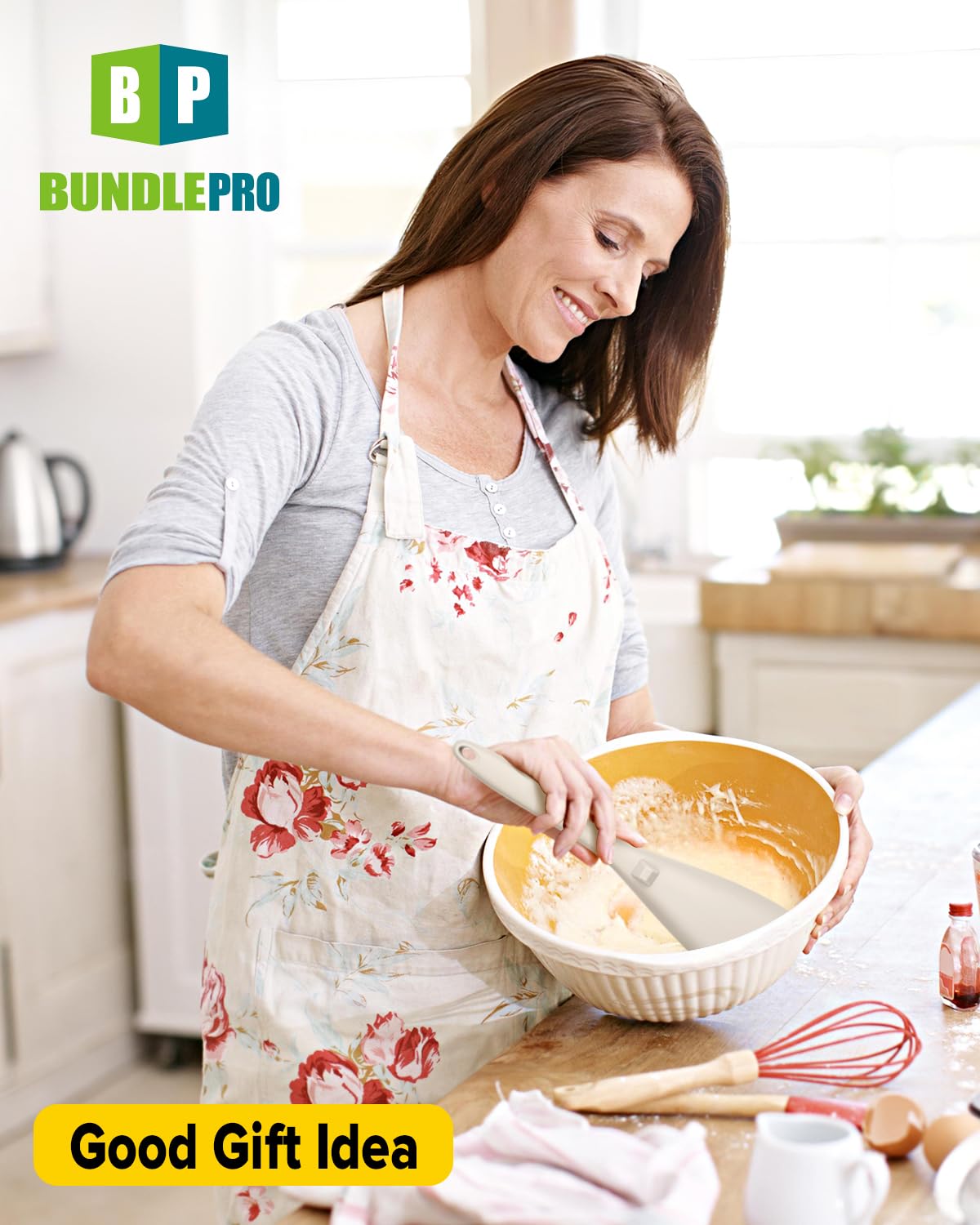 Bundlepro khaki multi-use spoon in action for scooping, mixing, and serving.