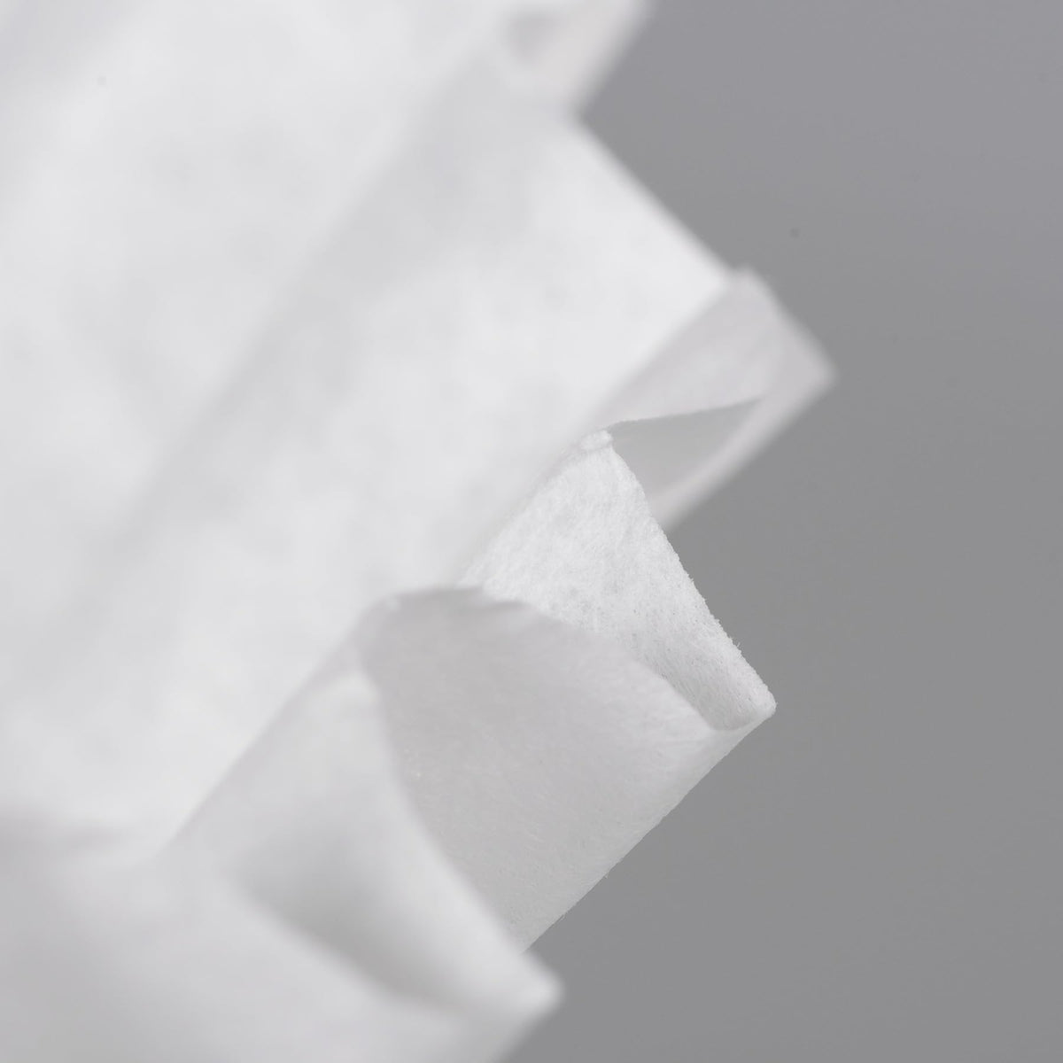 Bunn 20138.1000 white filters edge-detail highlighting taller sides to reduce overflow.