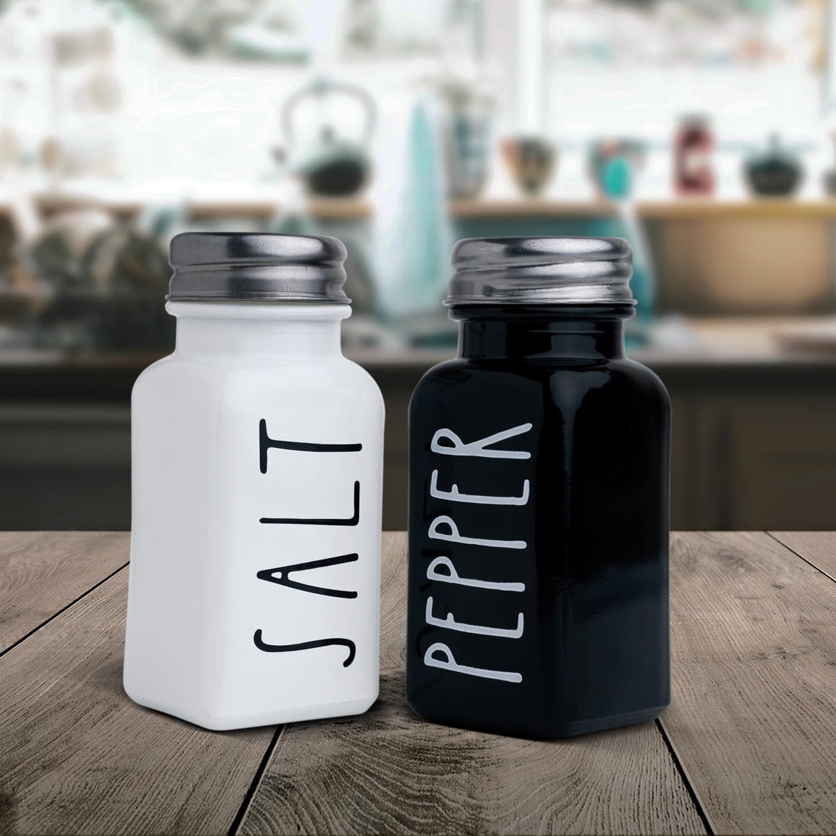 BUNOT glass salt and pepper bottles close-up shows clear contents and lids
