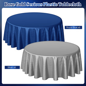 Buryeah wedding table setup with navy blue and silver round tablecloth.