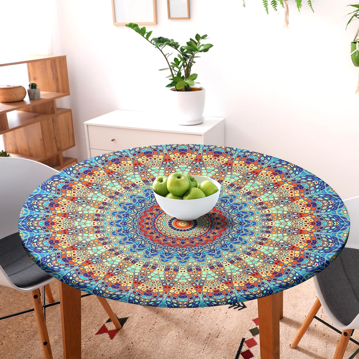 Butaluk round tablecloth features waterproof, durable fabric for outdoor surfaces.
